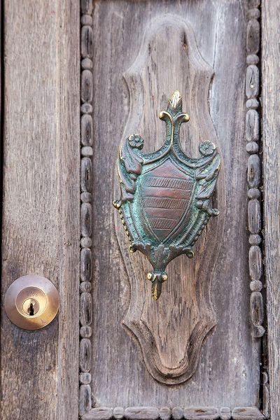 Eggers, Julie 아티스트의 Italy-Venice-Burano Island Closeup of brass detail on an old wooden door on Burano Island작품입니다.